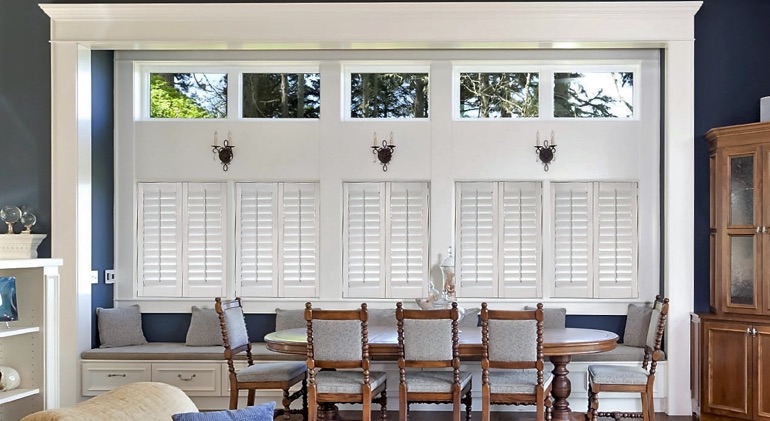Bluff City great room with Studio plantation shutters.